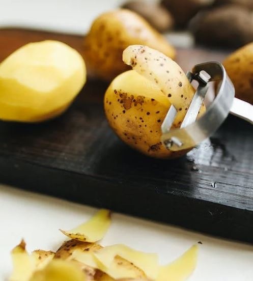 photo of peeling potatoes