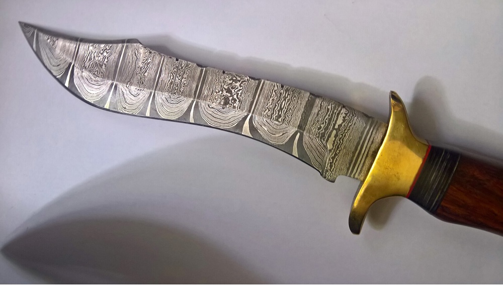 Damascus steel in a very modern Bowie knife design